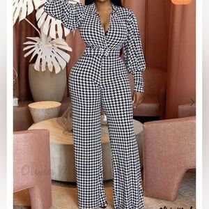Black & white houndstooth jumpsuit w/belt. Unworn but boutique hang tag m…